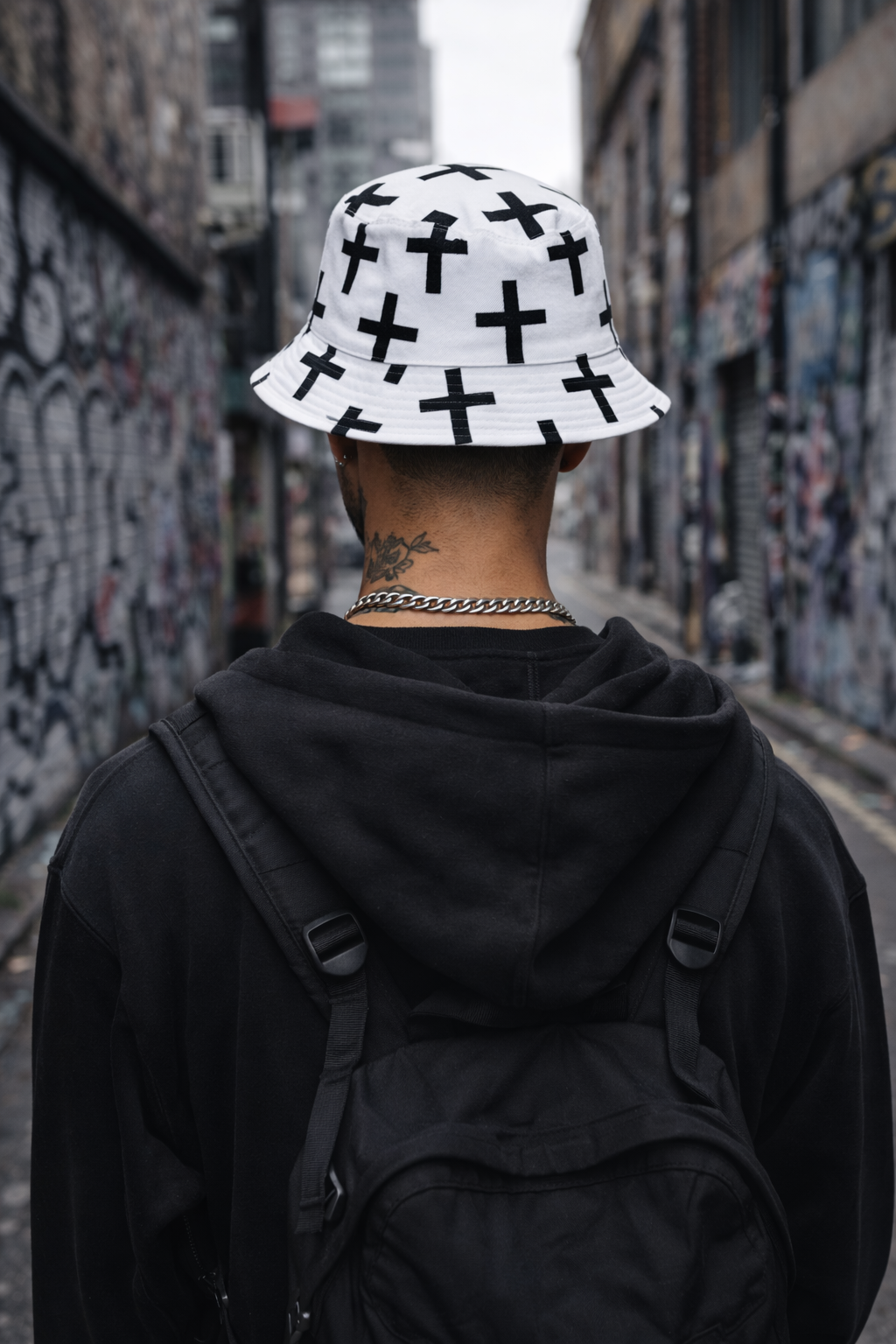 Unisex White Streetwear Bucket Hat with Black Cross Print – Urban Fashion Festival & Everyday Wear
